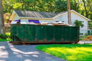 Dumpsters being full with garbage container trash on ecology and environment